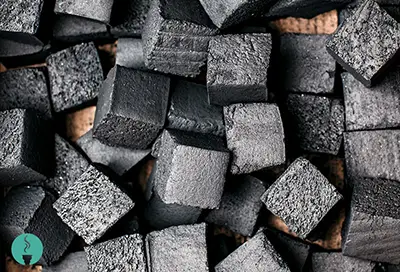 Pieces of hookah natural coconut charcoal in a pile