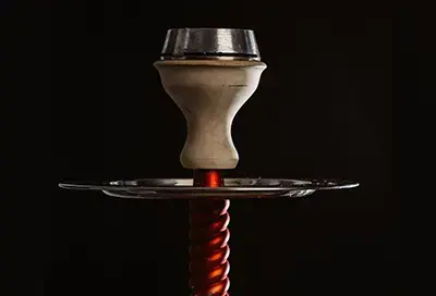 Hookah with bowl sitting atop with Kaloud Lotus HMD 